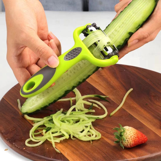 econome vert a double fonction pour eplucher un concombre