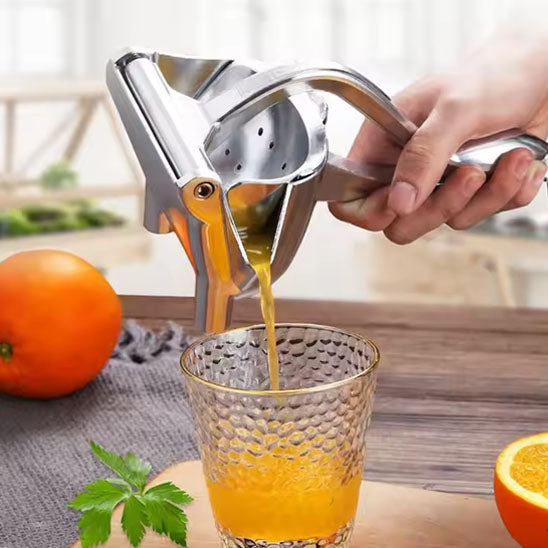 presse agrume manuel qui s'adapte a tout les cuisines et se lave facilement