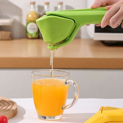 presse-agrume-vert-qui-combine-extraction-et-filtrage-de-la-pulpe-et-pepins